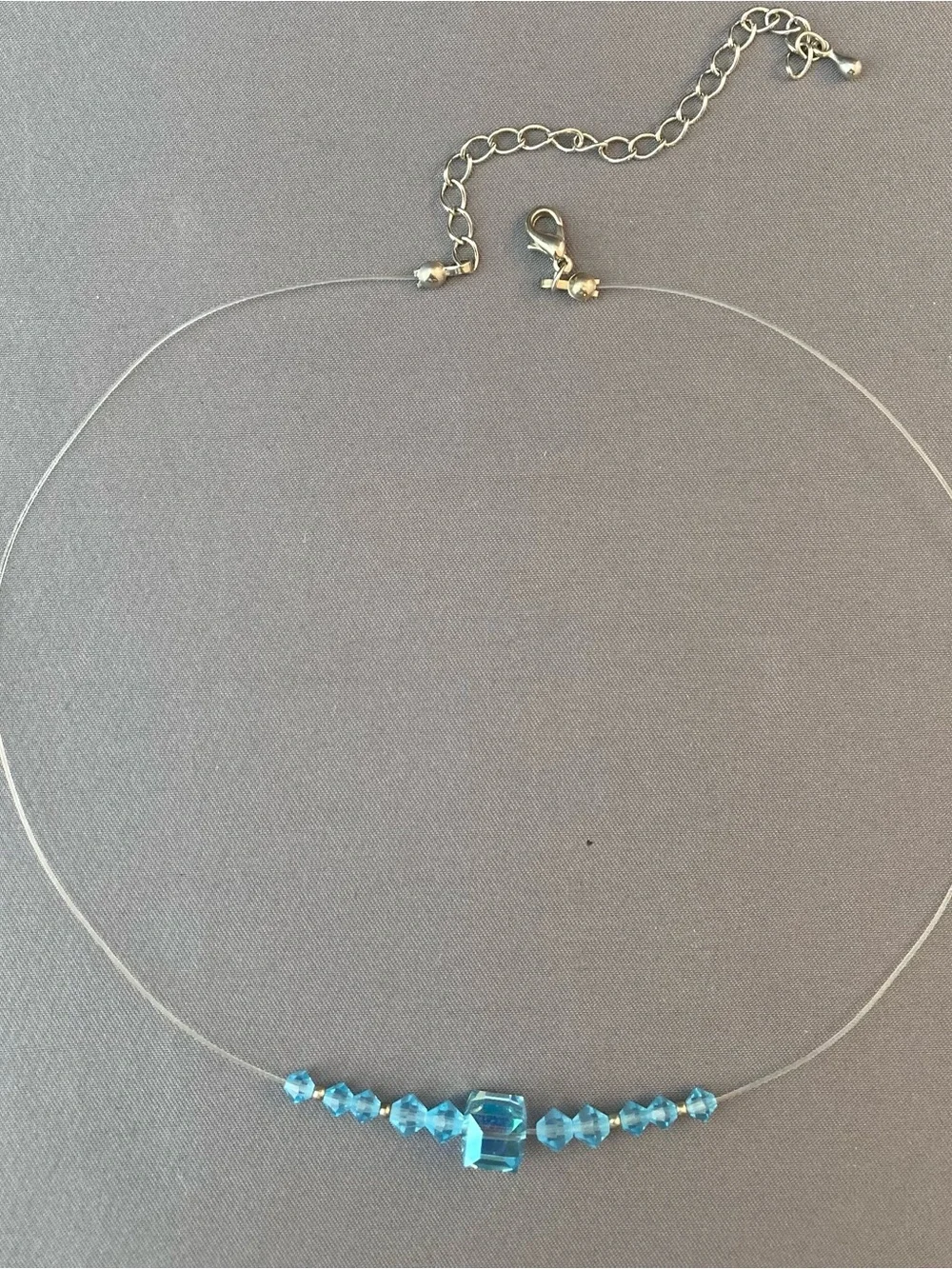 Light blue crystal bead necklace on monofilament 15 inches
